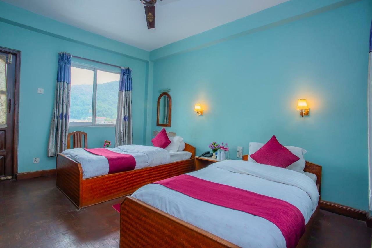 Spot On 445 New Hotel Natureland Pokhara Exterior photo